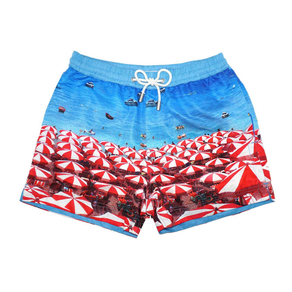 Our 'Barcelona Beach' kids shorts featuring a seaside scene of parasols and umbrella design. Matching design in our mens Luca design available.