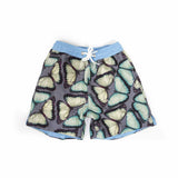 A Limited Edition geometric print in pale pink. The 'George' fit features our signature Thomas Royall blue waistband with a smart tailored fit.