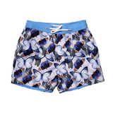 Butterfly Kids swim short in pale lavender-silver with cool, pale blue and navy butterfly print complete with blue drawstring waistband