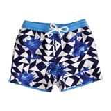  Boys blue and white geometric swim shorts with ice cream cone print in eco-friendly greige polyester. Blue drawstring waistband for adjustable fit