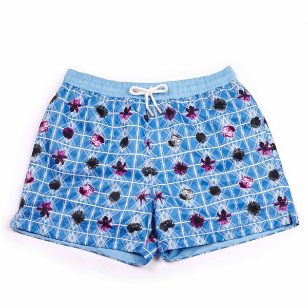 Our geometric 'Bahamas' shorts featuring a contrasting floral design. The 'Luca' fit features our signature Thomas Royall blue waistband with a relaxed day to night fit.