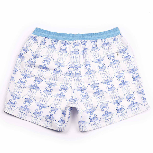 The 'Barbados' shorts featuring a graphical flamingo design in white and purple. This 'Luca' fit features our signature Thomas Royall blue waistband with a relaxed day to night fit.