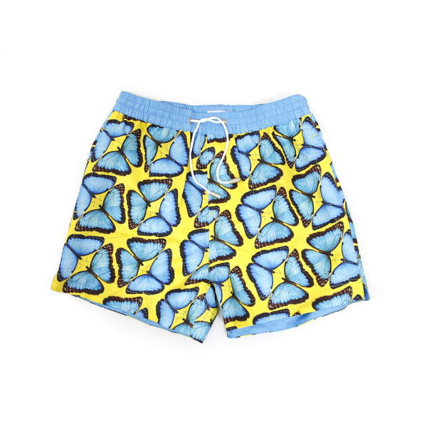 Our bright 'Brazil' kids shorts featuring a mirrored butterfly design in popping blue and yellow.