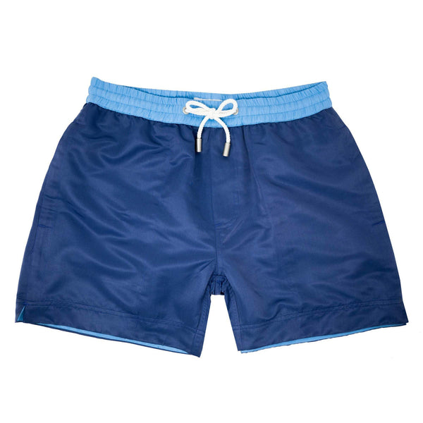 Our classic 'Cannes' shorts in a solid navy blue design. The 'Luca' fit features our signature Thomas Royall blue waistband with a relaxed day to night fit.