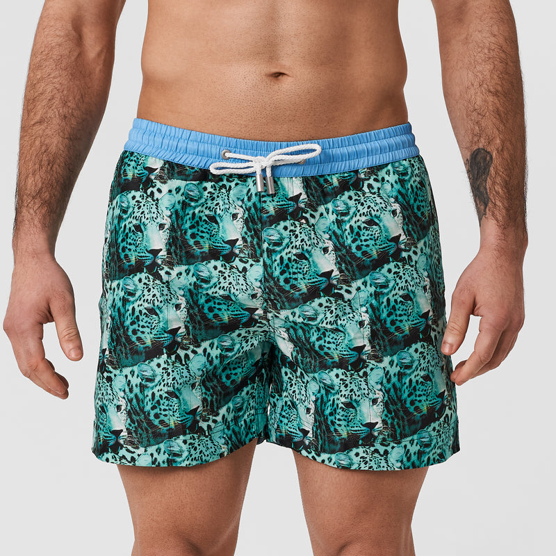 matching swim shorts for men and kids with bold pattern in blue green featuring an Asia Leopard photo