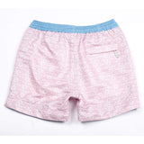 Our 'Queensland' kids shorts featuring a pink and white geometric design.