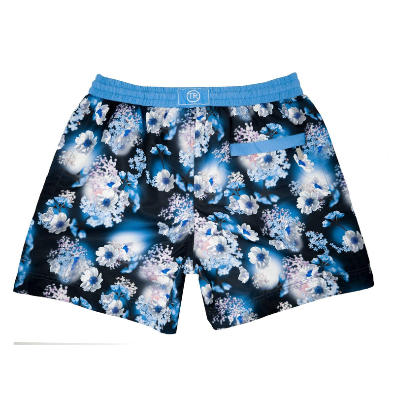 Our photographic 'Spain' kids shorts featuring a 3D floral design.