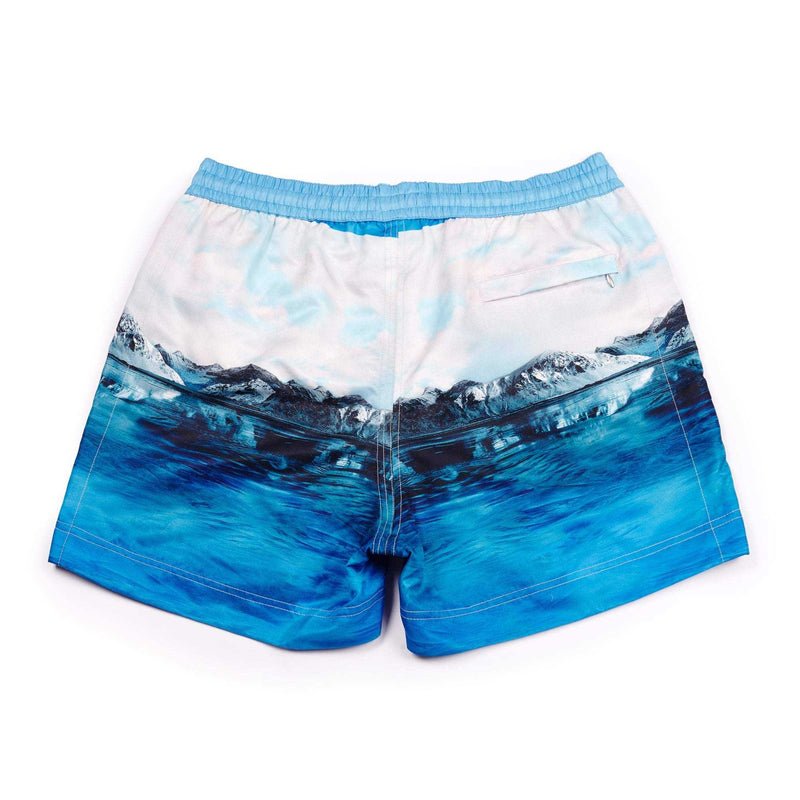 A photographic blue 'Arctic' shorts features a cool iceberg design. The 'Luca' fit features our signature Thomas Royall blue waistband with a relaxed day to night fit.