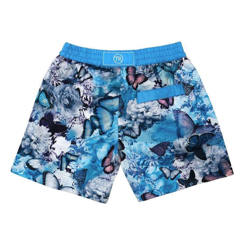 Tropical' kids shorts showcasing a our signature butterfly design. This 'Luca' style features our signature Thomas Royall blue waistband.